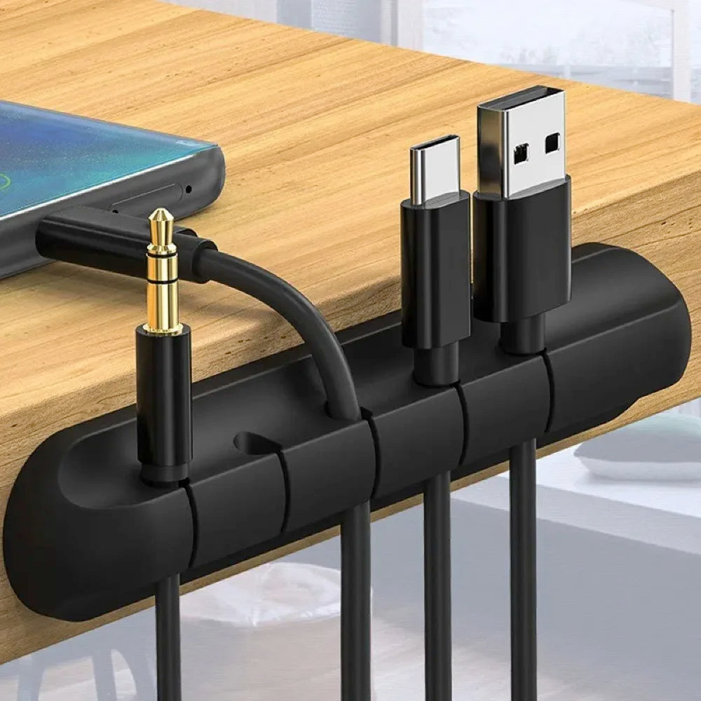 "USB cable connected to smartphone and laptop"