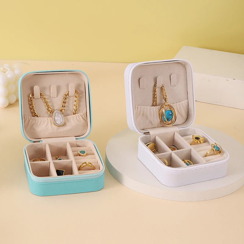 "Open portable jewelry case showing organized accessories"